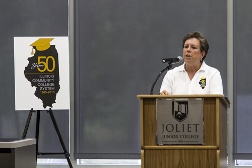 Dr. Karen Hunter Anderson, Executive Director of the Illinois Community College Board presents a proclamation from Gov. Bruce Rauner declaring July 15, 2015 through July 15, 2016 to a â€œThe Year of the Community Collegeâ€ in honor of the Illinois systemâ€™s 50 year of success.